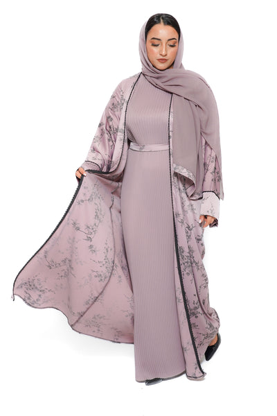 Abaya Manel dans les tons blush, tissu léger et effet plissé délicat