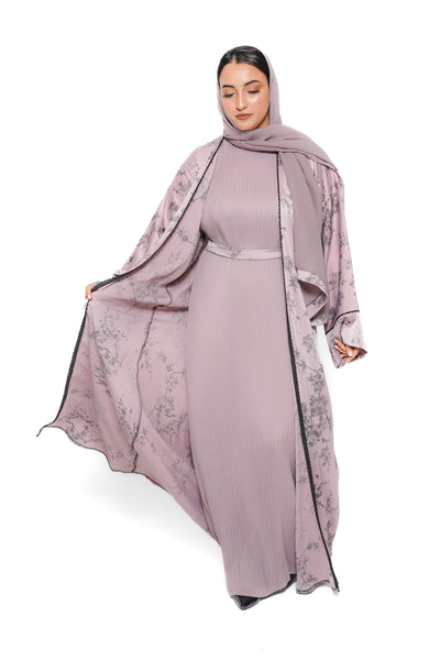 Élégante abaya rose au style féminin, parfaite pour les occasions spéciales et les soirées– vue de face